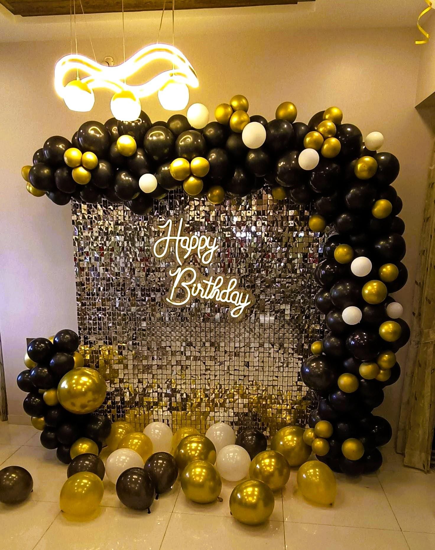 Unforgettable Nights: Black & Gold Neon Birthday Bash