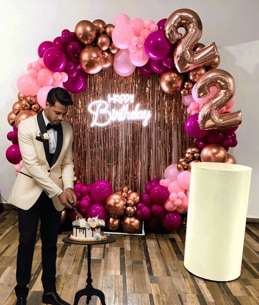 Birthday decoration for him with stylish balloon backdrop and modern celebration setup