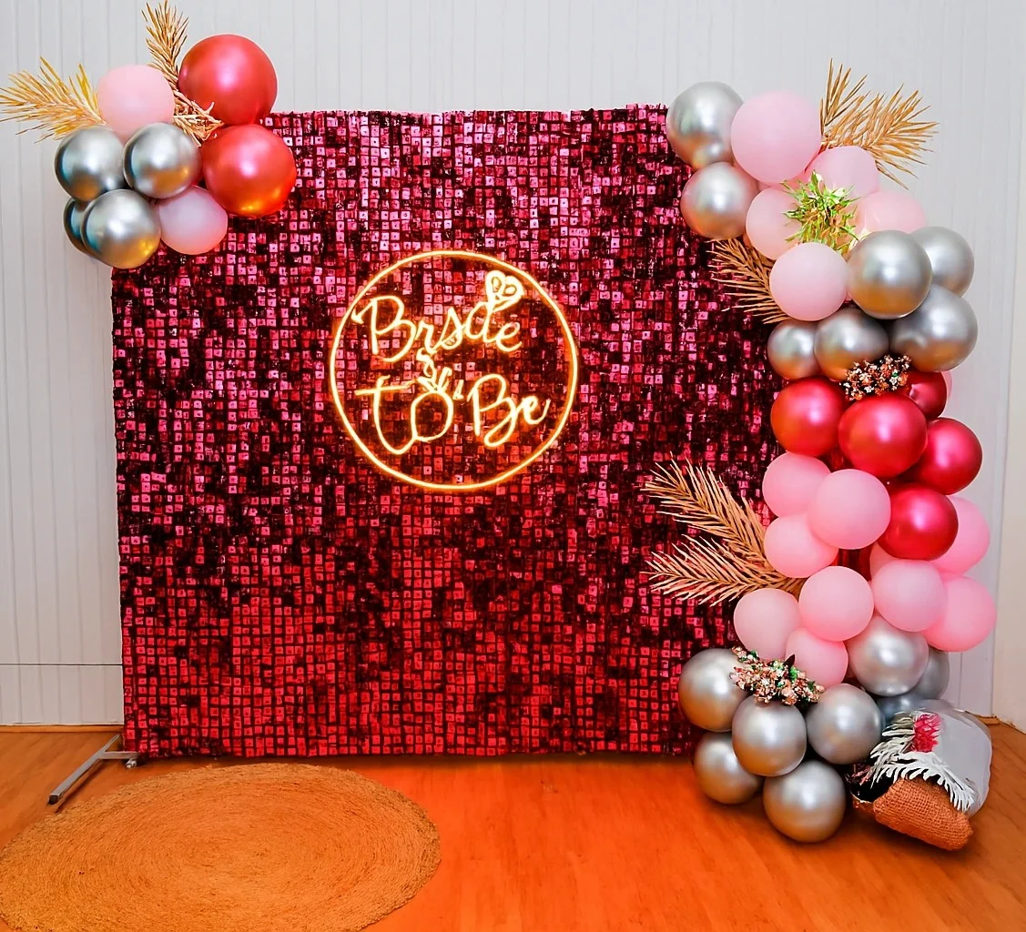 Rose gold bachelorette party decoration with a glamorous celebration backdrop