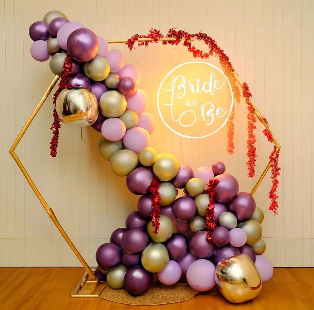 Bride-to-be bachelorette party backdrop with balloons and statement decor