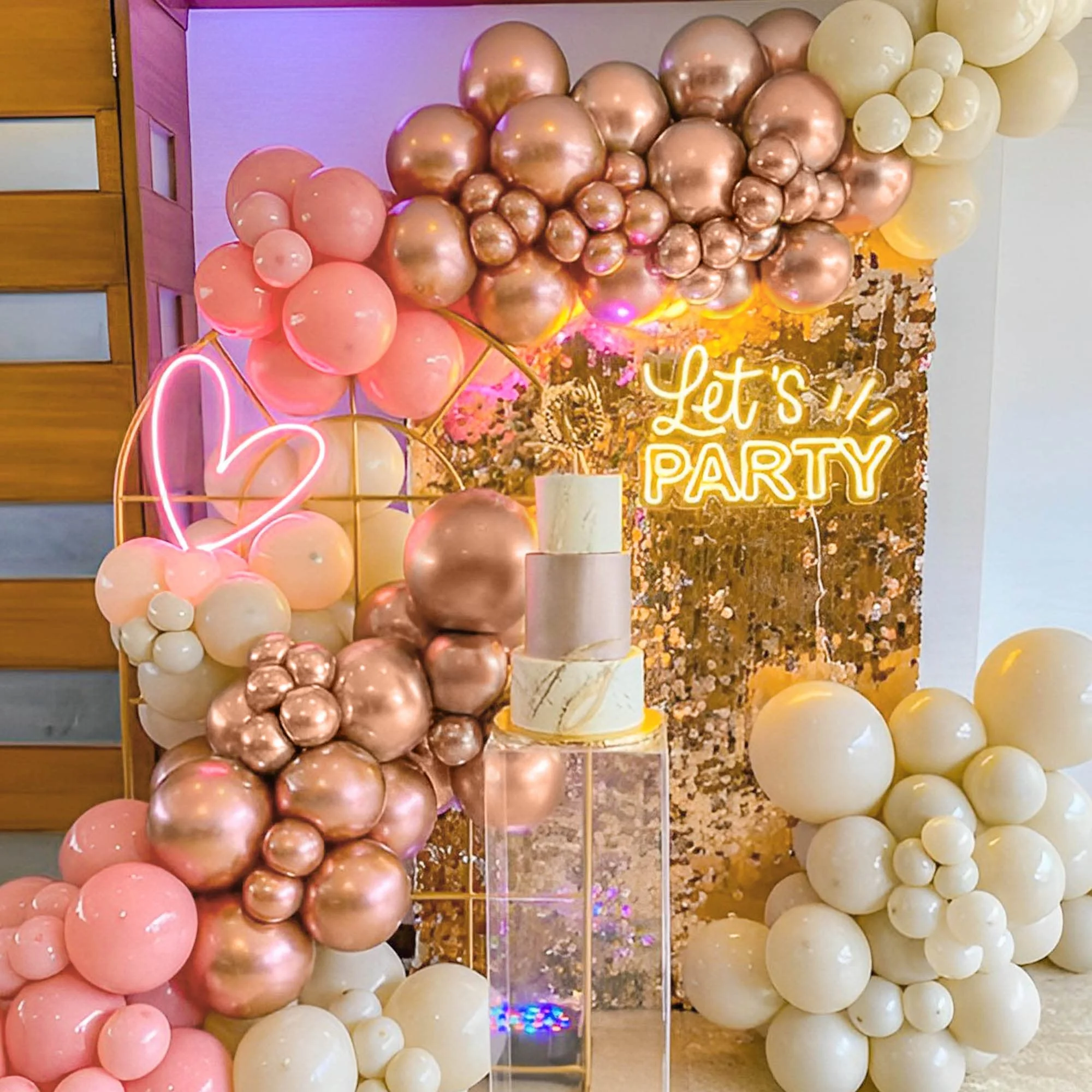 Grand balloon and sequin backdrop for premium anniversary celebrations