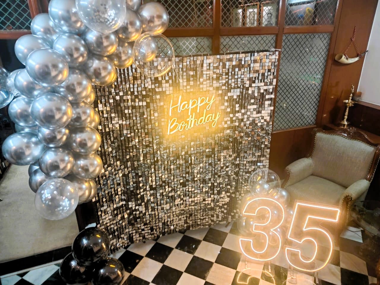 Silver-sequin-milestone-birthday-decoration-with-illuminated-number-35