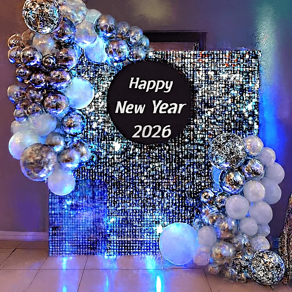 Silver sequin backdrop for a New Year celebration by Lets Celebrate