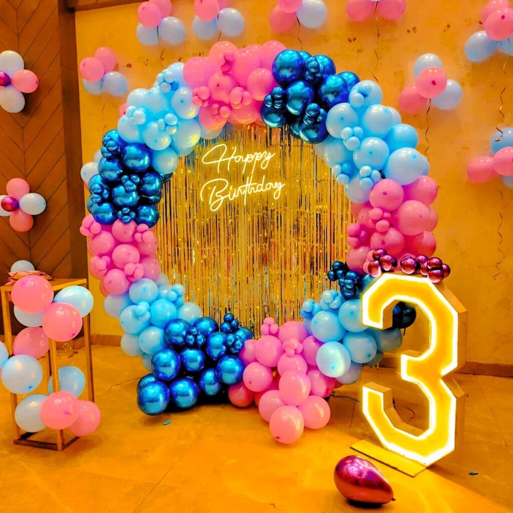 Birthday decoration at home with circular balloon ring and elegant party backdrop