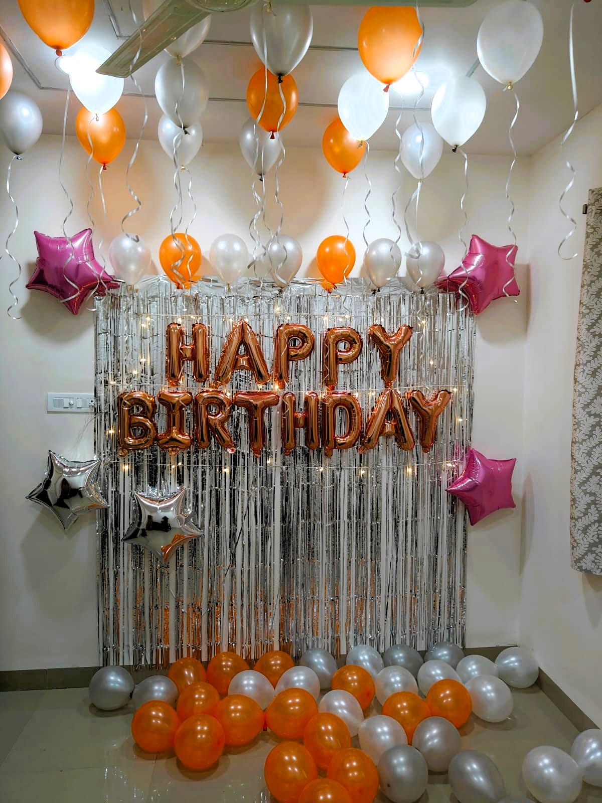 Simple birthday room decoration with balloons at home