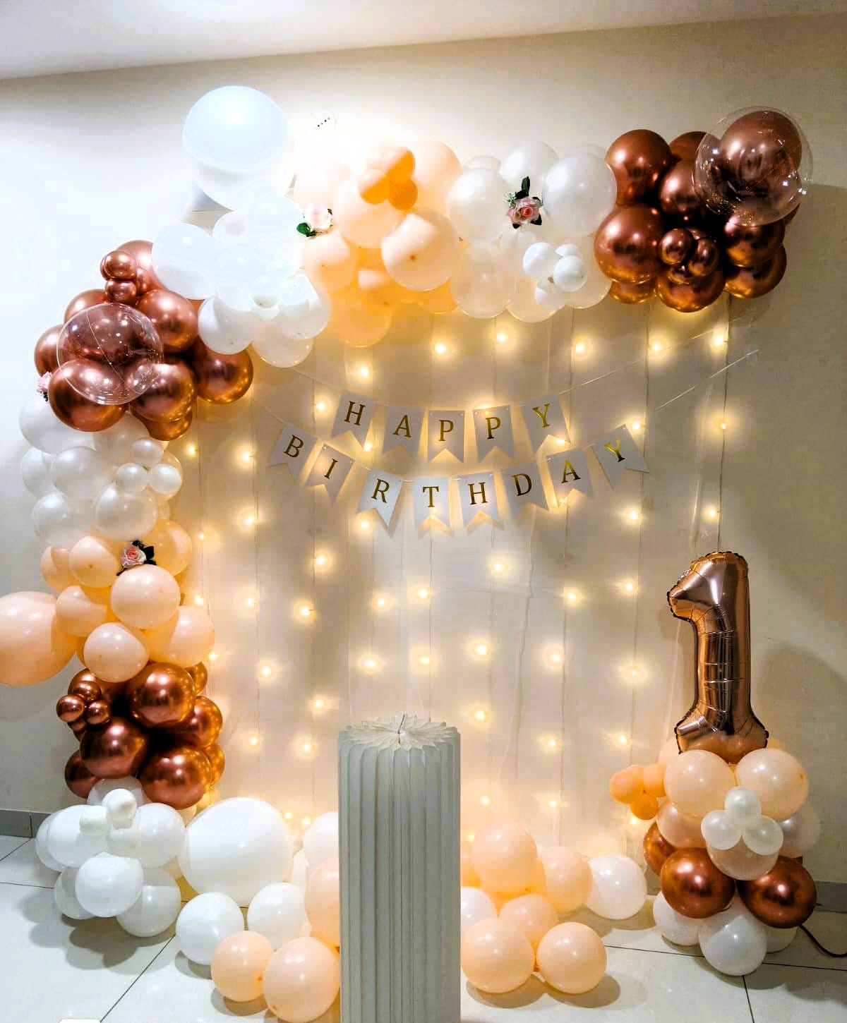 Pastel balloon decoration for a simple birthday celebration at home